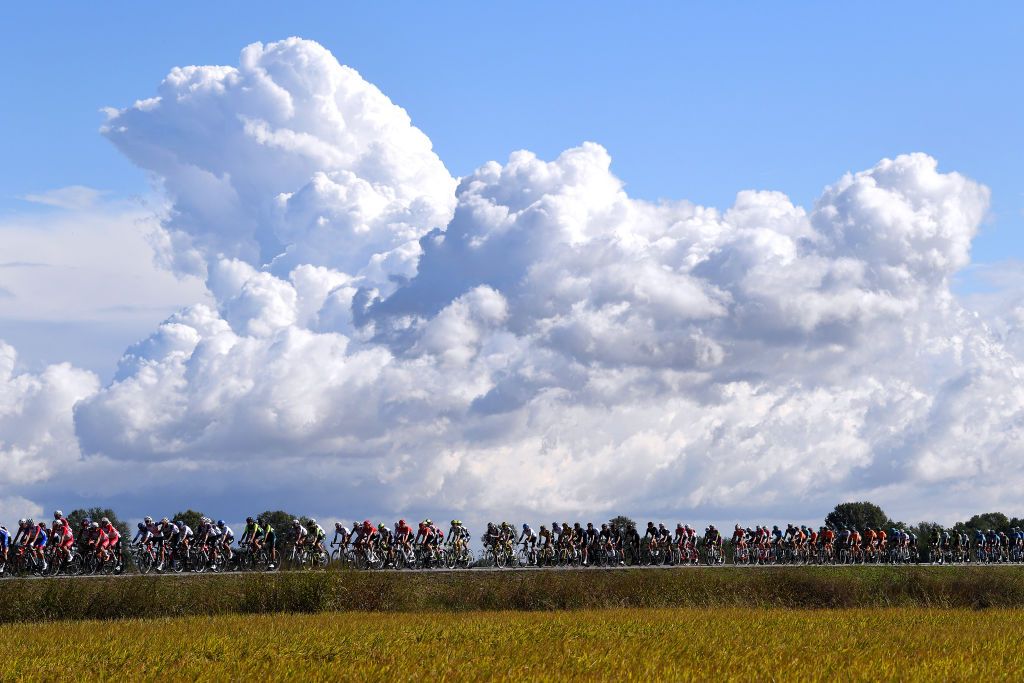 MILAN ITALY OCTOBER 06 A general view of the peloton competes during the 102nd MilanoTorino 2021 a 190km race from Magenta to Torino Superga 669m MilanoTorino on October 06 2021 in Milan Italy Photo by Tim de WaeleGetty Images