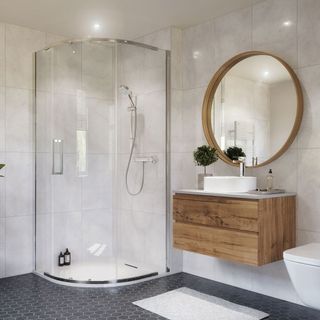 bathroom with shower and glass cabin