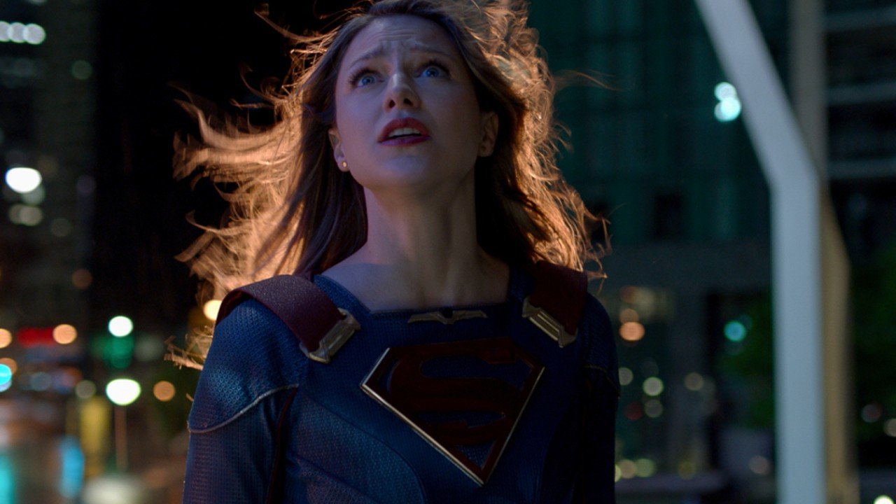 Supergirl looking at the sky worriedly