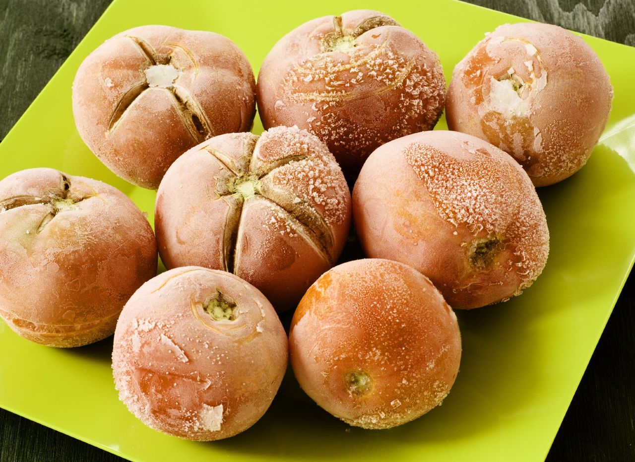 Plate Of Frozen Whole Tomatoes