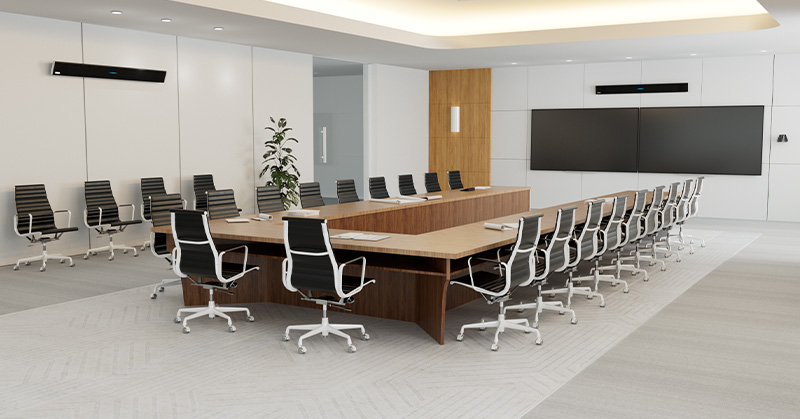 A large corporate meeting room with empty seats ready for high-quality audio with the new Nureva HDL410 system.