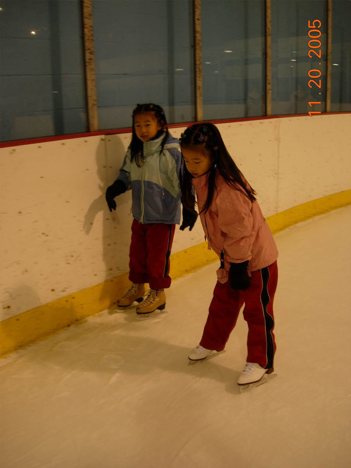 Kristina Ang and her sister Alexandria ice skating in 2005.