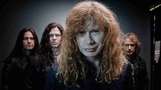 Megadeth posing for a photograph in 2011