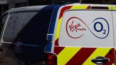Virgin Media O2 logo and branding pictured on the back of a utility van.