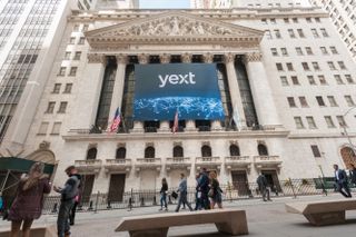 Yext sign on a large city building