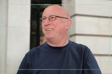 a close up of Ken Bruce smiling outside BBC Broadcasting house