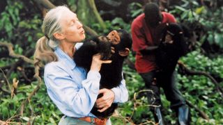 Jane Goodall with a chimpanzee