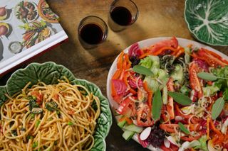 noodle dish and salad