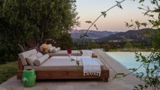 Outdoor day beds pictured poolside
