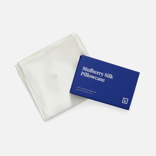 Ivory silk pillowcase with royal blue packaging