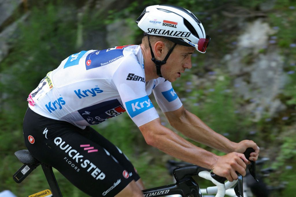 Soudal Quick-Step team&#039;s Belgian rider Remco Evenepoel cycles in the final ascent of the Plateau de Beille during the 15th stage of the 111th edition of the Tour de France cycling race, 197,7 km between Loudenvielle and Plateau de Beille, in the Pyrenees mountains, southwestern France, on July 14, 2024. (Photo by Thomas SAMSON / AFP)