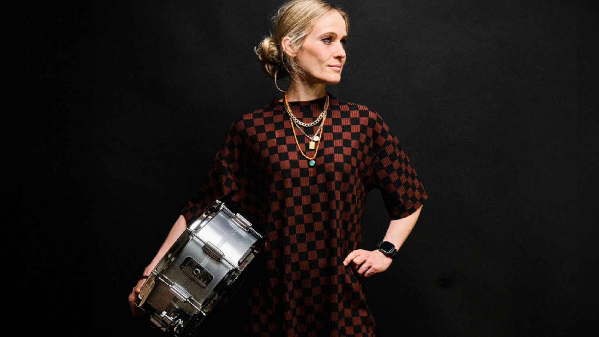 Anika Nilles holding her signature snare drum