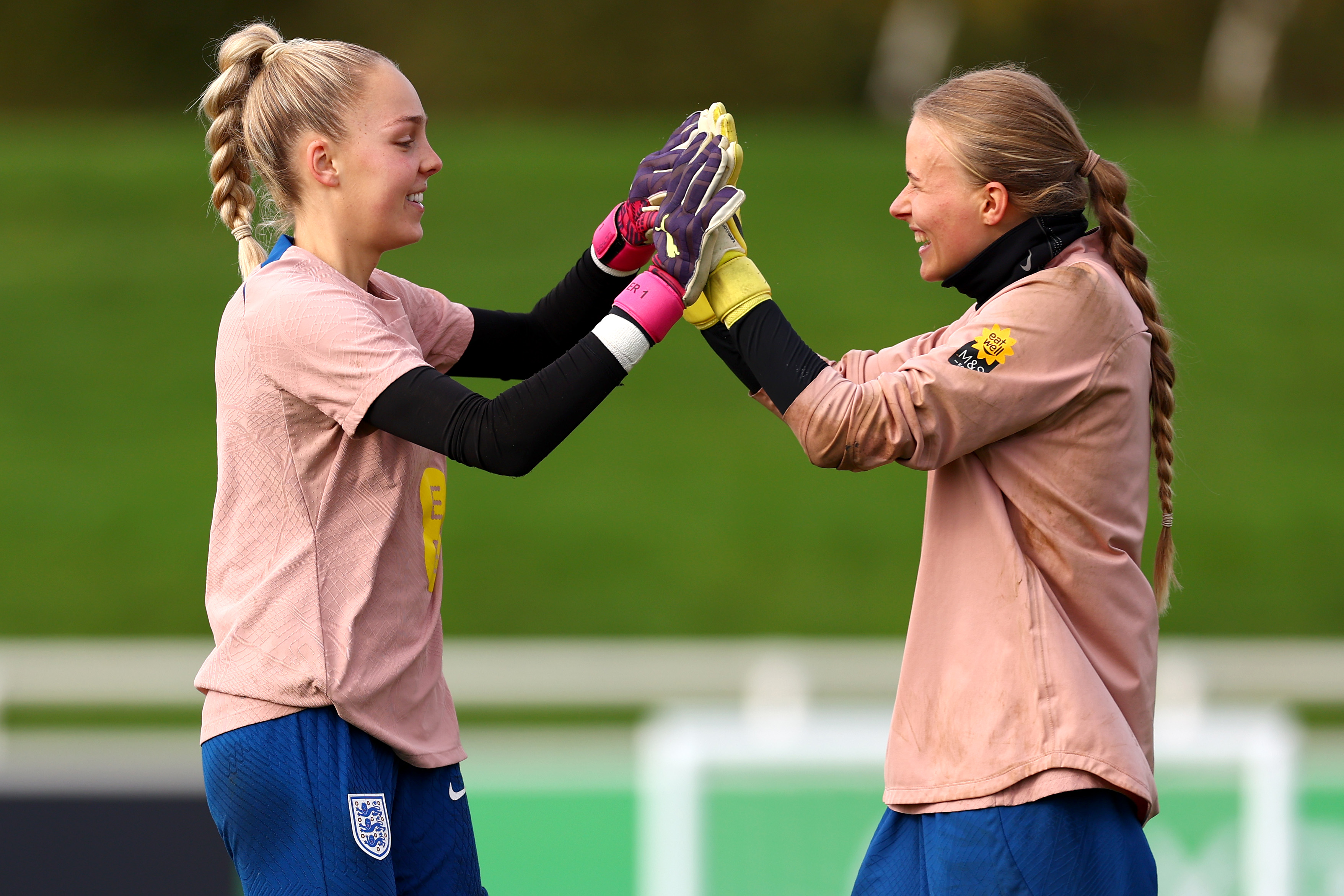 BURTON UPON TRENT, ENGLAND - OCTOBER 28: Ellie Roebuck and Hannah Hampton of England interact during a training session at St George&#039;s Park on October 28, 2023 in Burton upon Trent, England.