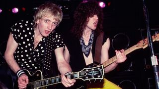 Phil Collen and Rick Savage perform onstage during the 'Pyromania' tour at Nassau Coliseum (later Nassau Veterans Coliseum), Uniondale, New York, March 25, 1983. 