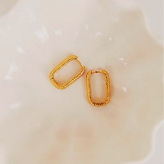 a product shot of sand square earrings by Byglaze