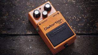 Boss DS-1 distortion pedal on wooden floor