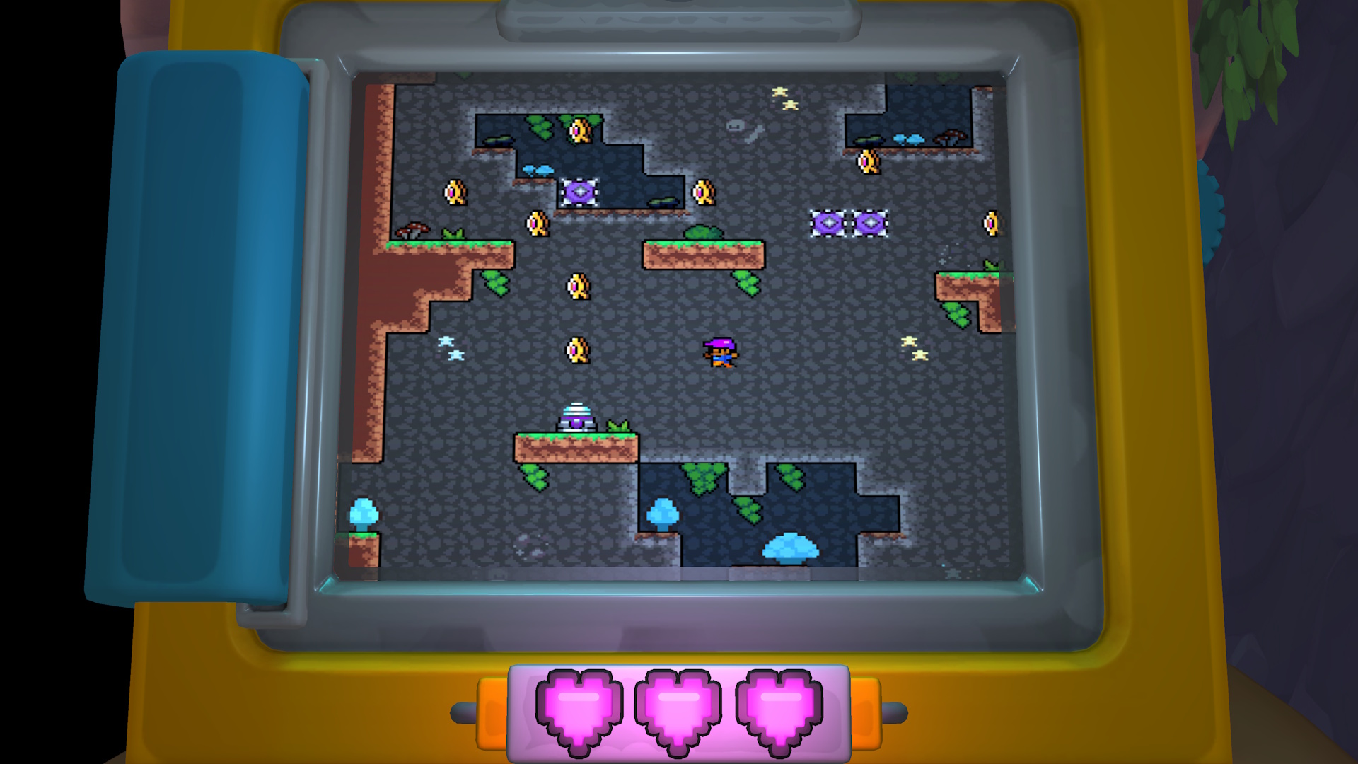 Screenbound screenshot showcasing the Qboy up close with a 2D level