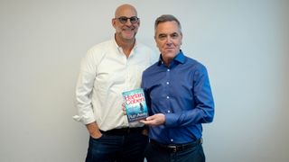 Harlan Coben and James Nesbitt standing side by side against a white background and holding a paperback copy of the book, Run Away