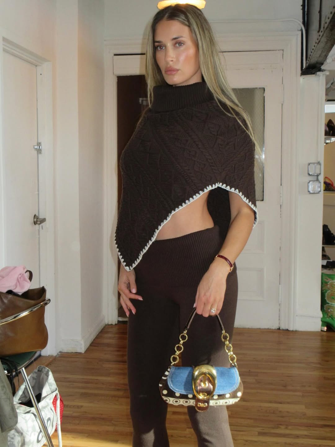 Francesca Aiello wearing a Frankies Bikinis knit cape