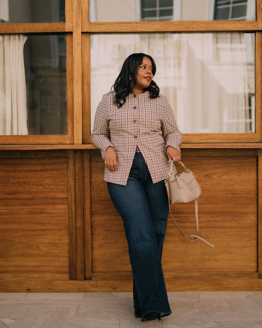 Woman wearing flared jeans