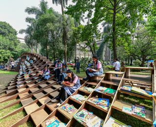 Timber seating pavilion for reading in India