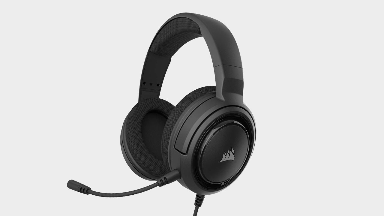 Image of a a black headset with a plain background.