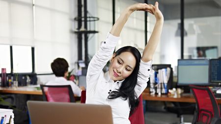 bigstock-asian-business-woman-stretchin_16x9.jpg