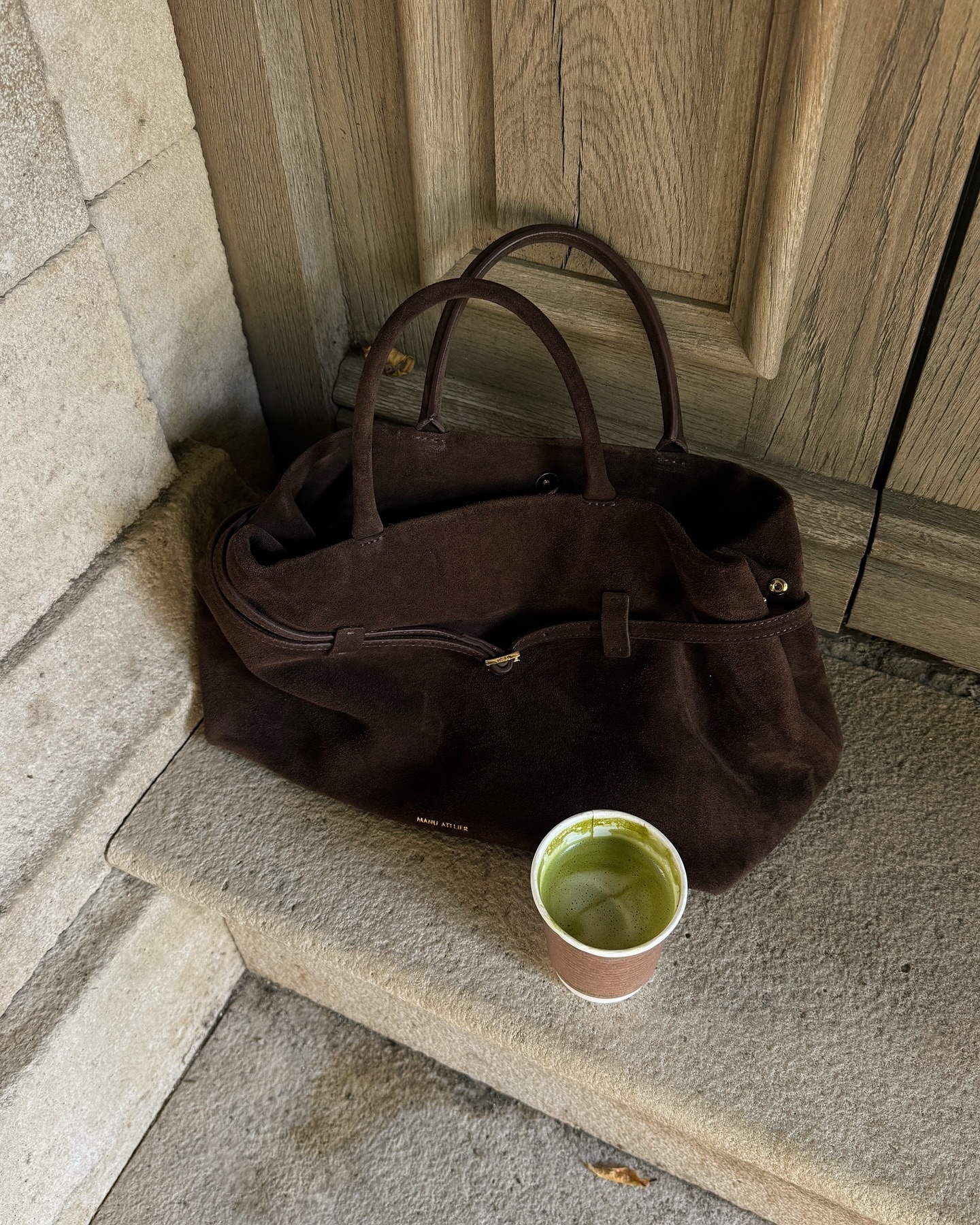 An image of @fakerstrom with one of 2026's biggest bag trends, the belted bag.