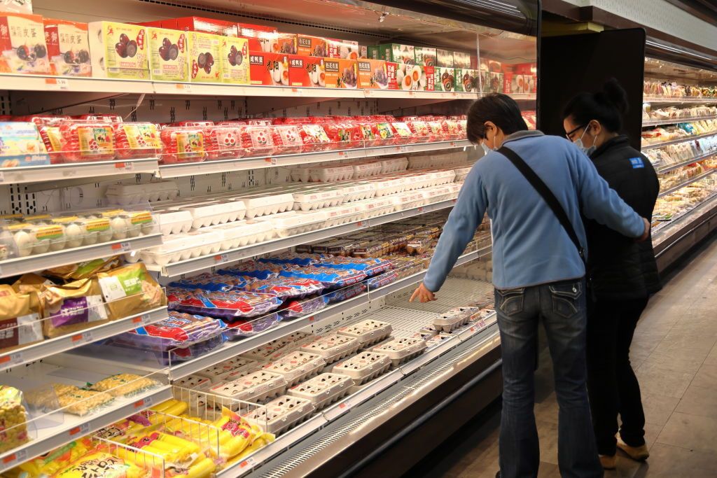 Shoppers in a grocery store.