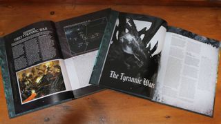 The Tyranid Codex for 10th Edition beside the 9th Edition equivalent on a wooden table