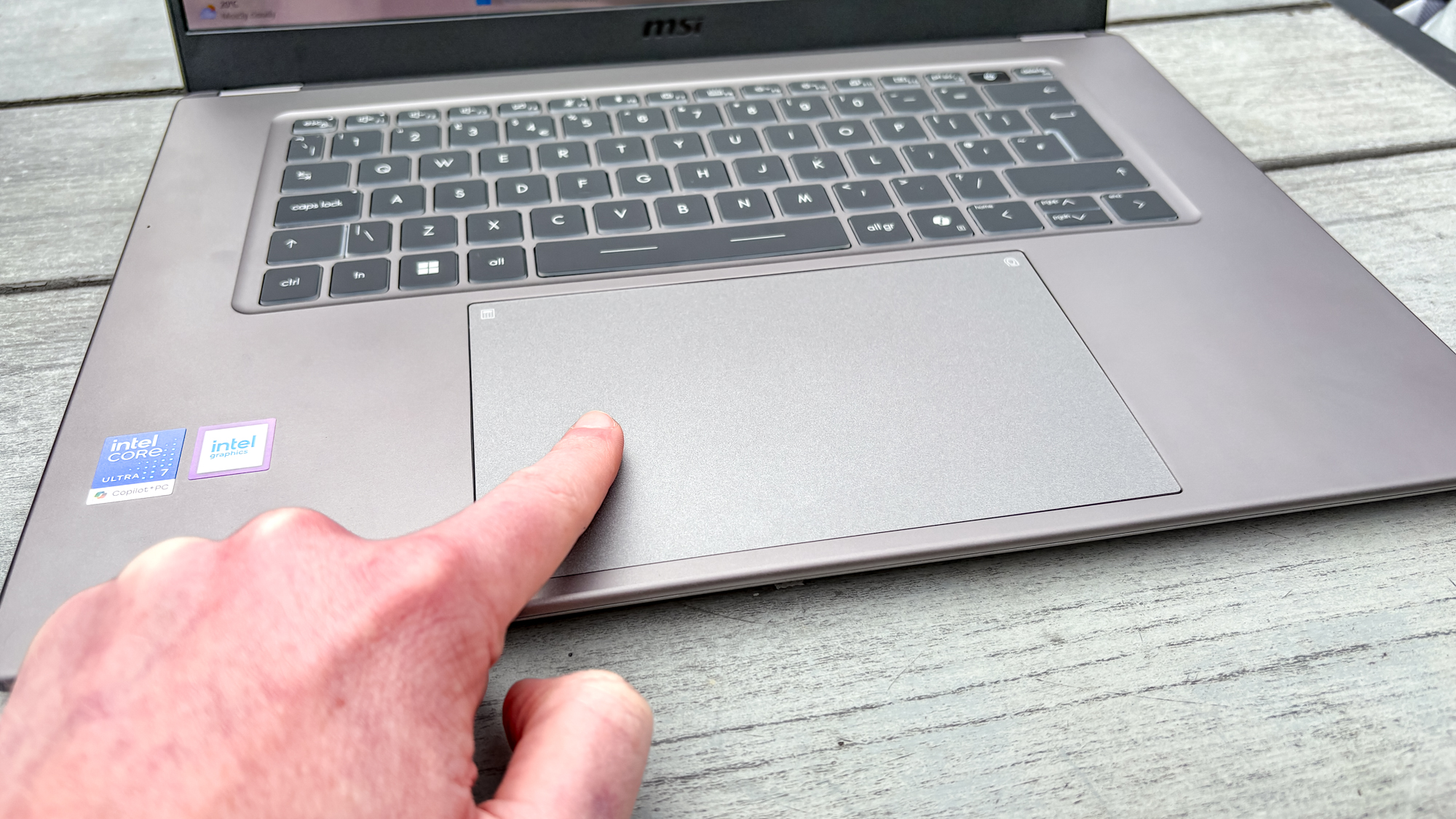 MSI Prestige 16 AI+ touchpad with finger touching it
