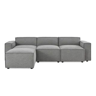A modular sofa with grey upholstery