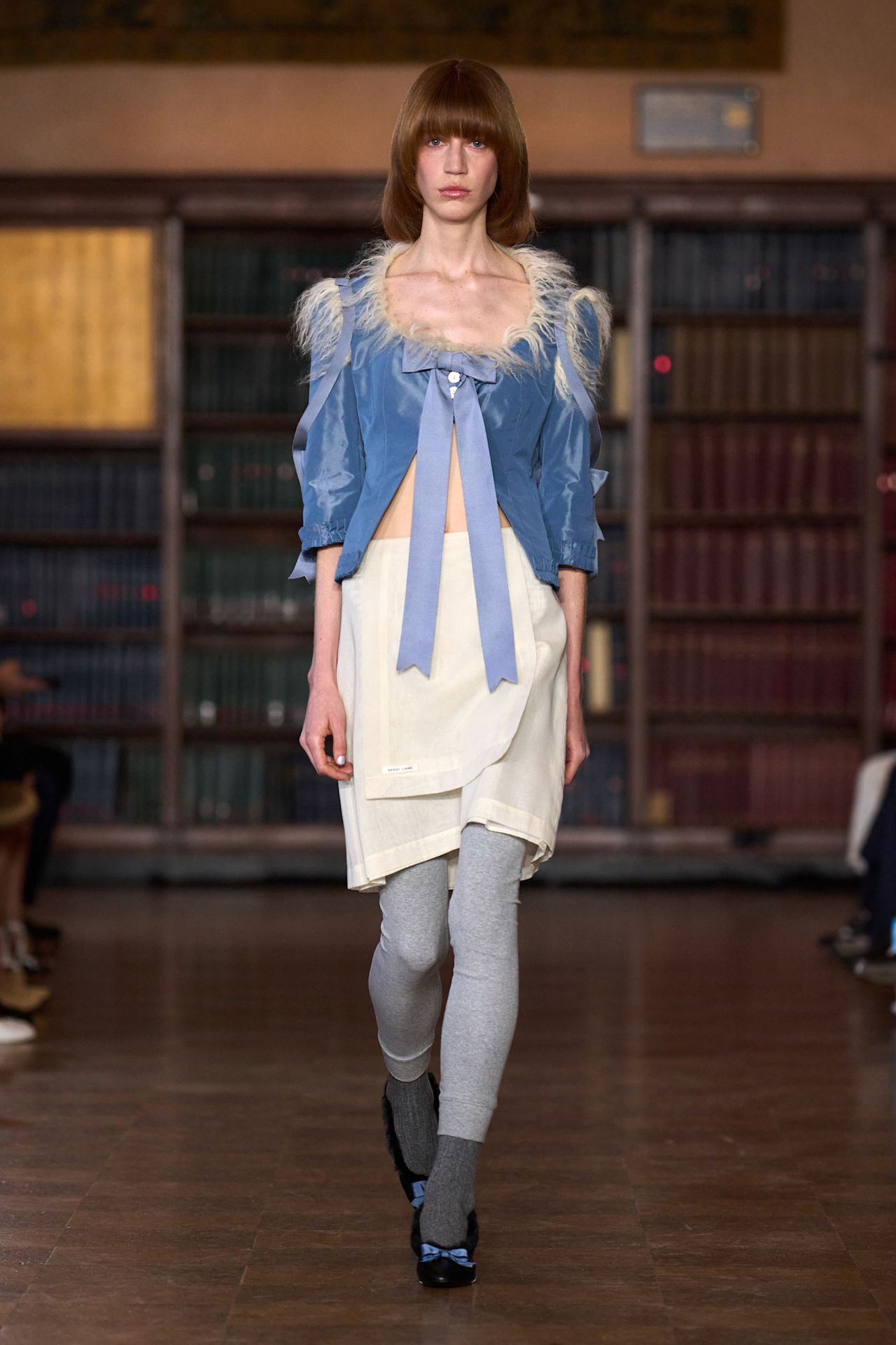 models walk the Sandy Liang Fall 2026 fashion show runway wearing slipper shoes