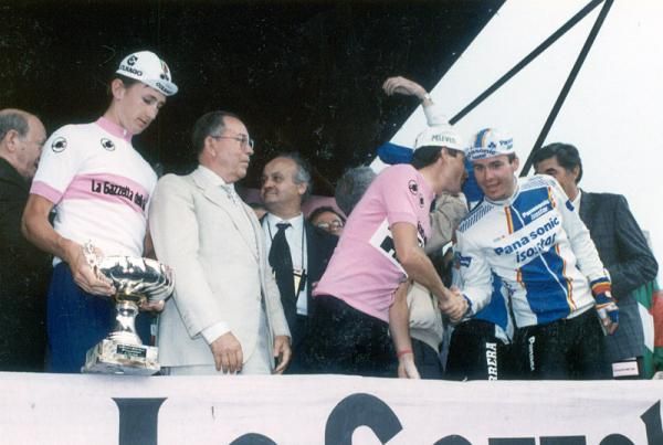 1988 Giro d'Italia champion Andy Hampsten congratulates runner-up Erik Breukink. On the left is a young Dmitri Konyshev, winner of the that year's amateur Giro.