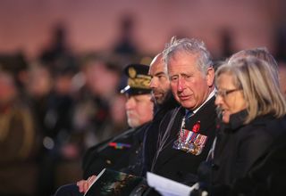 Prince Charles (2ndR) and French Prime Minister Edouard Philippe (2ndL) attend on April 25, 2018 ceremonies marking the 100th anniversary of ANZAC Day in Villers-Bretonneux