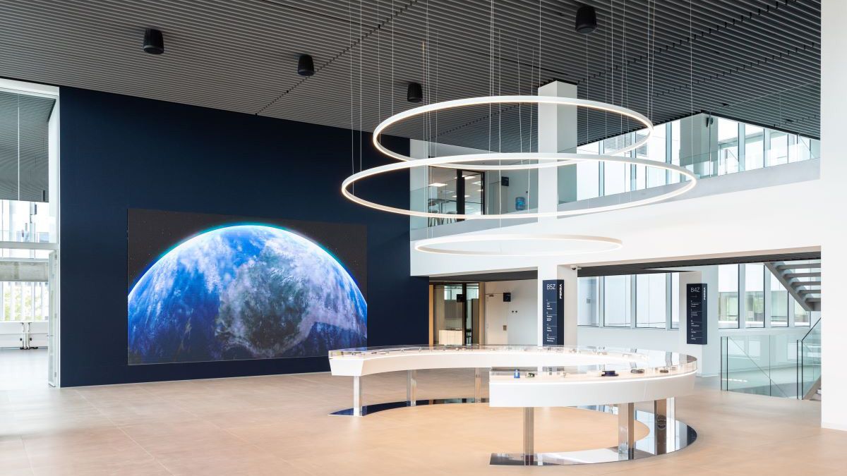 A massive Philips Public LED High Brightness 7000 Series displays shows a view of the Earth.