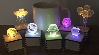 The best Glowforge machines; a photo of acrylic lights created on a laser cutter