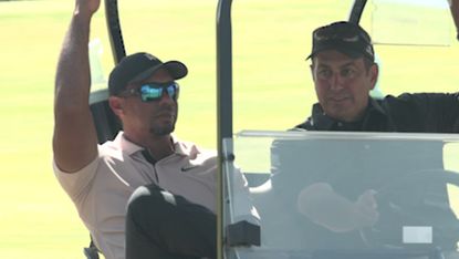 Tiger Woods in a golf cart before the World Wide Technology Championship at El Cardonal