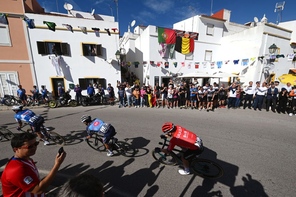 ALTO DO MALHAO PORTUGAL FEBRUARY 18 LR Mattia Cattaneo of Italy and Team Soudal Quick Step Hugo Nunes of Portugal and Team Radio Popular Paredes Boavista and Florian Senechal of France and Team Arkea BB Hotels compete in the breakaway while fans cheer during the 50th Volta ao Algarve em Bicicleta 2024 Stage 5 a 1658km stage from Faro to Alto do Malhao 514m on February 18 2024 in Alto do Malhao Portugal Photo by Dario BelingheriGetty Images