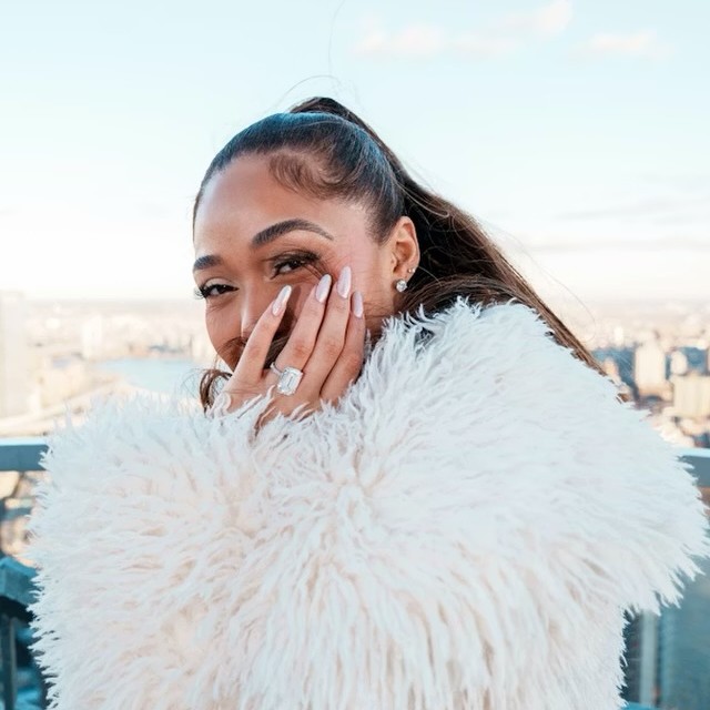 Jordyn Woods shows off her engagement manicure.