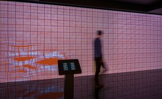 An iPad control panel allows visitors to change the patterns on the interactive installation
