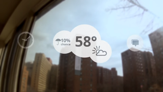 Screenshot from Google &quot;One Day&quot; concept video for Glass showing weather overlaid on a headset