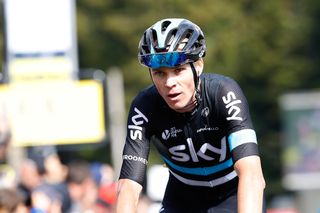 Chris Froome crosses the finish line during stage 2 at the Criterium du Dauphine
