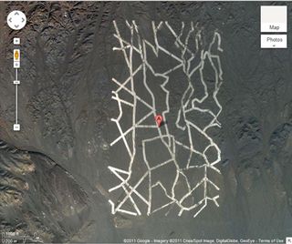 A strange zigzag pattern in the Gobi Desert in China. Coordinates: 40.452107,93.742118. Credit: Copyright 2011 Google - Imagery copyright Cnes/Spot Image, DigitalGlobe, GeoEye