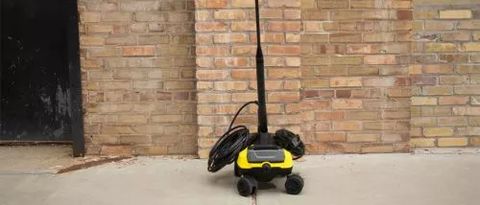 The Karcher K 3 Follow Me stood in front of a brick wall