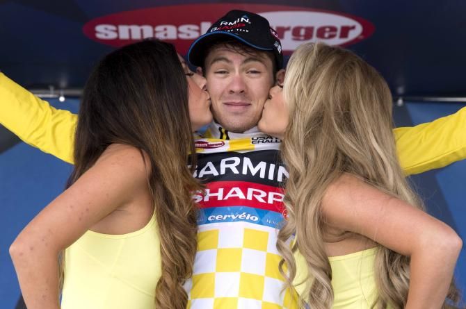 Alex Howes (Garmin-Sharp) getting kissed by the podium hostesess