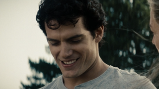 Henry Cavill smiling in Man of Steel