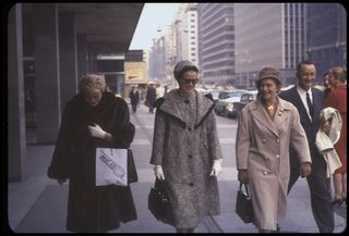 Women wearing leather gloves.