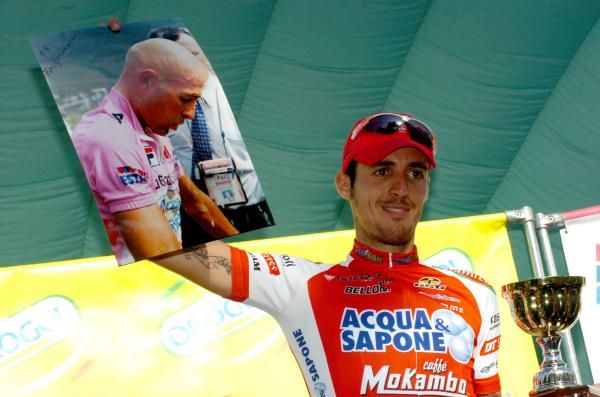 Taborre shows a photograph of Marco Pantani