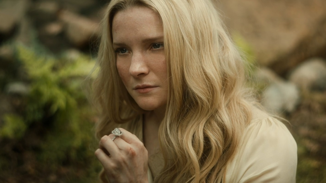 Galadriel looking ahead of her with Nenya back on her hand in The Rings of Power season 2 episode 8